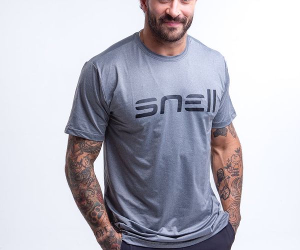 Portrait of a smiling man in sportswear looking confident.